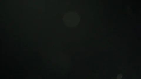 White Dust Particles Flying On Black Background. Slow motion. Stock Footage 74677310