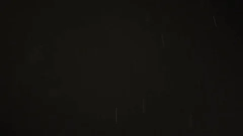 White Dust Particles Flying On Black Background. Slow motion. Stock Footage 74686126
