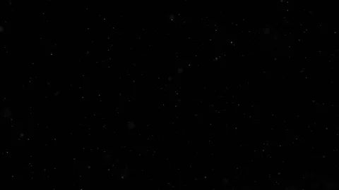 White Dust Particles. Looks like snow. Looped footage. Stock Footage