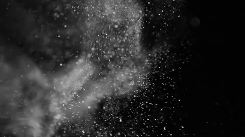 White dynamic dust particles in motion on black background Stock Footage 178482879
