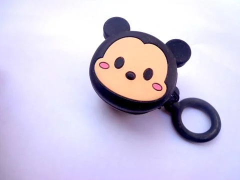 White earbud covers with micky mouse stickers Photos