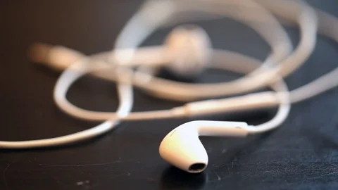 White Earphones On Black Table Stock-Footage 91556544