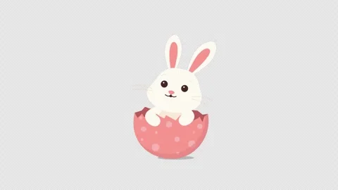 A white Easter bunny swings from side to side in a painted egg shell on a Stock Footage 309283103