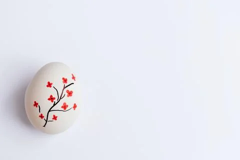 White Easter egg with red flowers Stock Photos