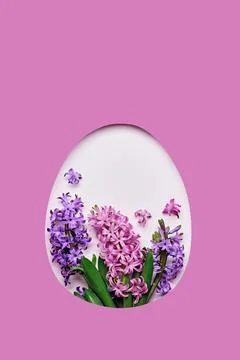 White easter Egg shaped hole with copy space on pink background. Beautiful Stock Photos