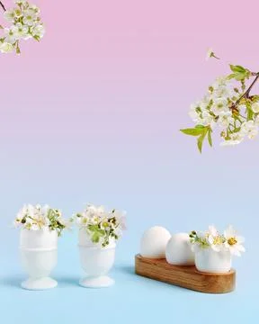 White Easter eggs with flowers Stock Photos