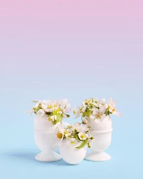 White Easter eggs with flowers Stock Photos