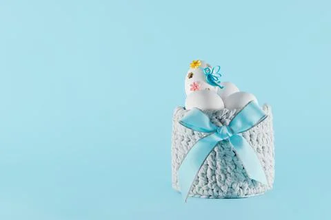 White Easter eggs in a gray basket Stock Photos