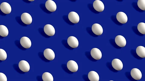 White Easter Eggs rotating in rows in seamless loop on navy blue background Stock Footage 150045731