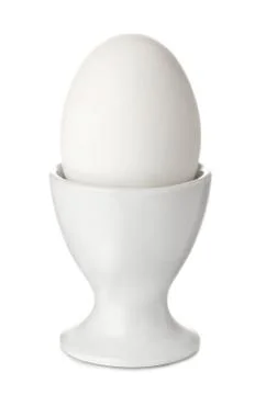 White egg in eggcup Stock Photos