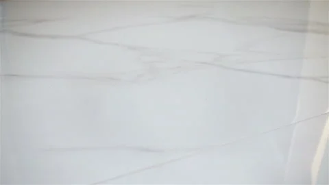 White Egg falls and Breaks on the Floor. Slow Motion Video Clip Video stock 128921467