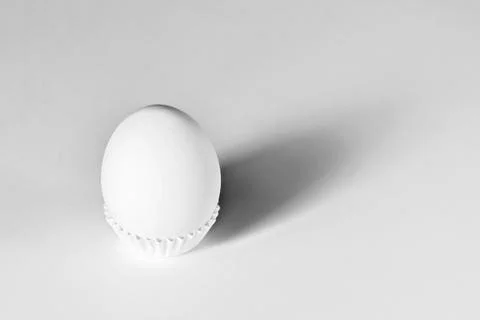 White egg on a white isolated background with shadow. Ingredient.Healthy food Stock Photos