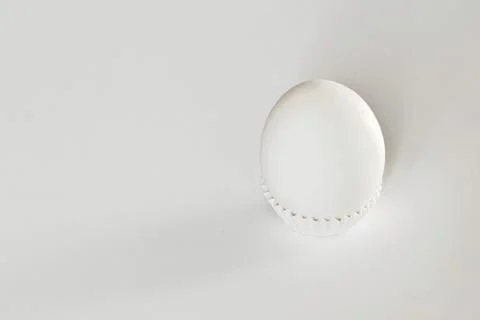 White egg on a white isolated background with shadow. Ingredient.Healthy food Stock Photos
