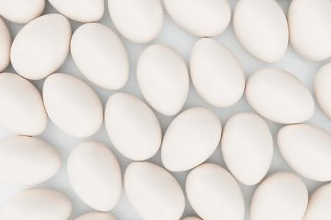 White eggs. Background of eggs. Concept happy easter. Eggs as a symbol of the Stock Illustration
