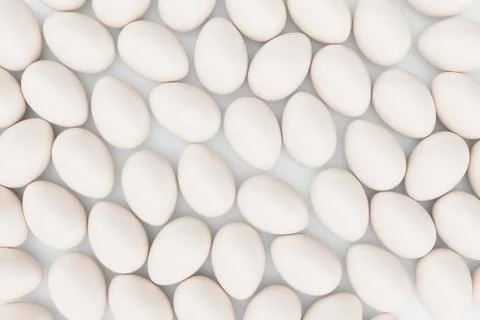 White eggs. Background of eggs. Concept happy easter. Eggs as a symbol of the Stock Illustration