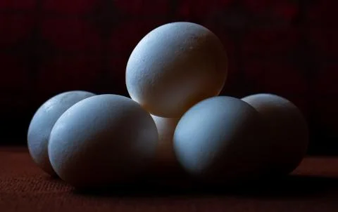 White eggs on a brown background Foto stock