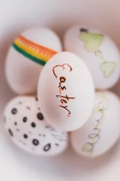 White-eggs-each-decorated-for-easter Stock Photos