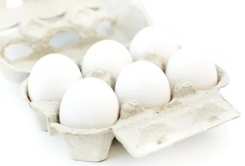 White eggs Stock Photos