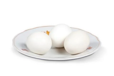 White eggs on a plate Foto stock