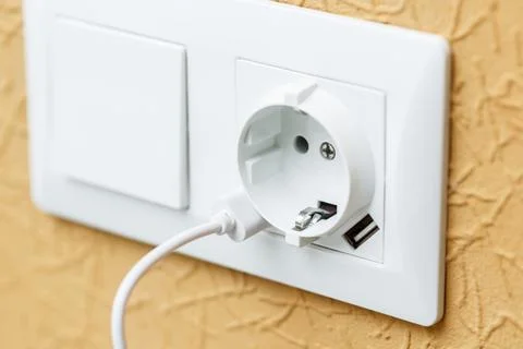 White electric plug with built in usb ports white cord. Stock Photos