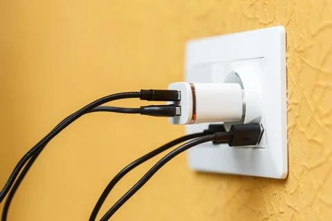 White electric plug with built in usb ports and usb charger with multiple b.. Stock Photos