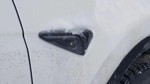 White Electric Vehicle Side Camera Frozen With Ice And Snow In Winter Stock Footage 330276991