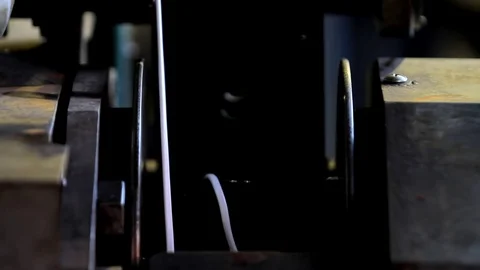 A white electrical cable is wound on a coil Video stock 76951034