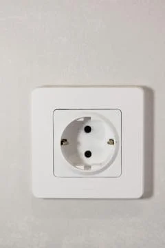 White electrical outlet on the wall Stock Photos