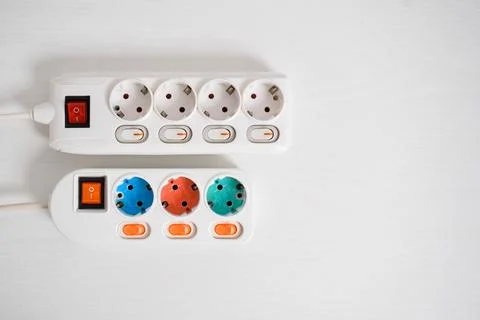 White Electrical plug in outlet socket at home isolated on white background,  Stock Photos