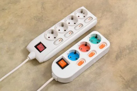 White Electrical plug in outlet socket at home Stock Photos