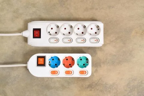 White Electrical plug in outlet socket at home Stock Photos