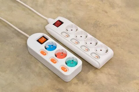 White Electrical plug in outlet socket at home Stock Photos