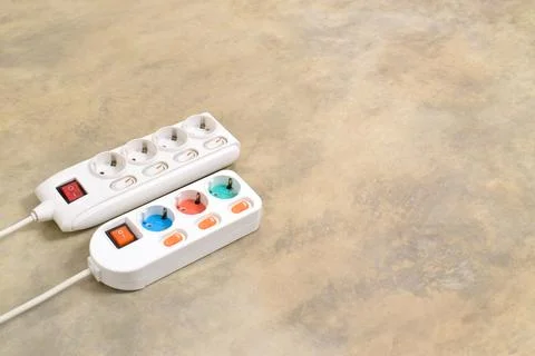 White Electrical plug in outlet socket at home Stock Photos