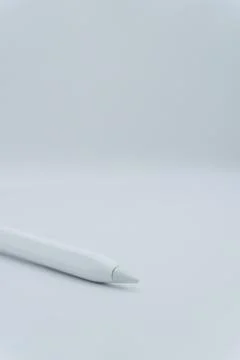 A white electronic pen on a white background, an electronic pencil for a tablet Stock-Fotos
