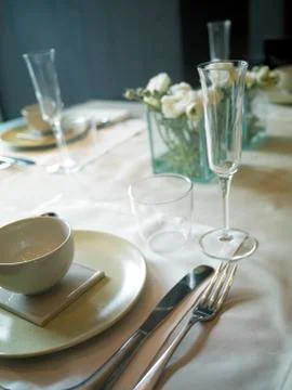 White elegant table set up with flowers Stock Photos