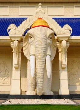 White elephant statue standing in front of the building Stock Photos