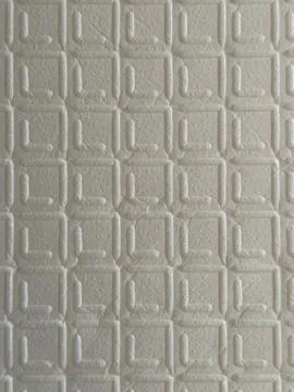 White Embossed Geometric Pattern Wallpaper Texture Close-Up Stockfoto's
