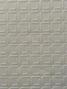 White Embossed Geometric Pattern Wallpaper Texture Close-Up Stock Photos