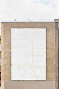 White empty billboard on the wall Stock Photos