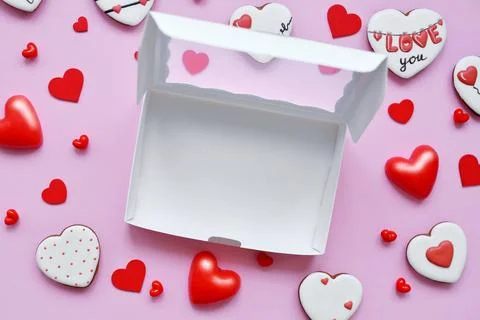 White empty box for delivery of muffins, cookies, cakes on pink background fo Stock Photos