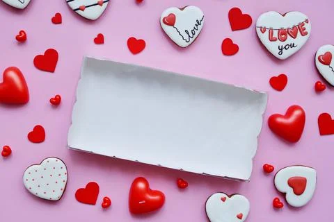 White empty box for delivery of muffins, cookies, cakes on pink background fo Stock Photos