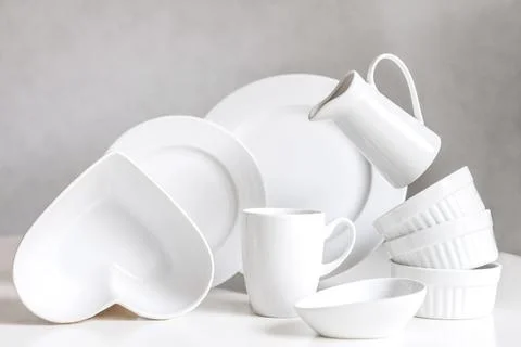 White empty ceramic tableware for serving on the table. Kitchen still life Stock Photos