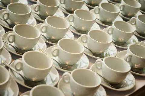 White empty coffee cups awaiting service Stock Photos