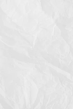 White empty crumpled baking paper background. Top view. Stock Photos