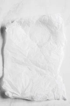White empty crumpled baking paper background. Top view. Foto stock