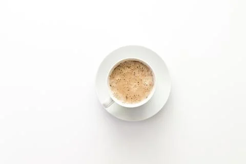 White empty desk with one coffee in the middle. Copy space. Isolated. Stock Photos