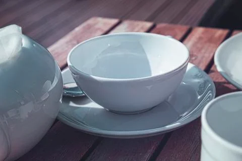 White empty dishes on a table in a restaurant Foto stock