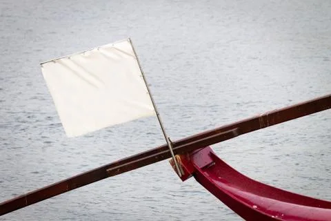 White Empty Flag on Boat Bow Stock Photos