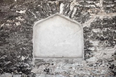 White empty niche frame in old stone wall 写真素材