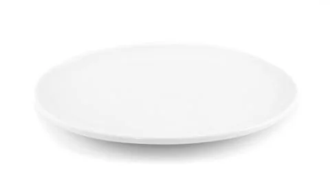 White empty plate ( oval dish ) over a white background. Stock Photos